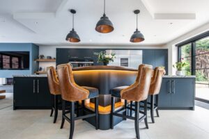 leather chairs, black kitchen, stainless steel, steel handles, black pendant, led strips, krittle, crittle,